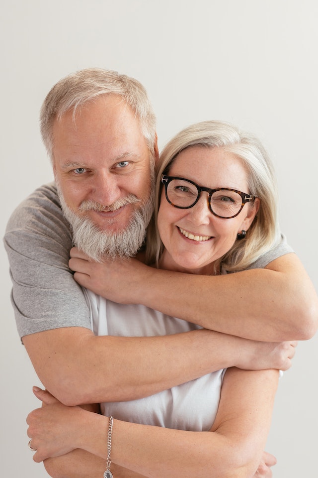 A happy middle-aged couple embracing