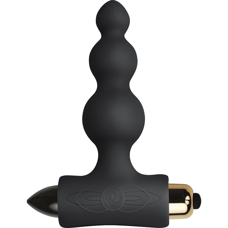 A black, T-shaped silicone anal vibrator with a series of bubbles designed for targeted stimulation. The base includes a pinpoint tip for vibrations, and the toy is powered by a gold battery.