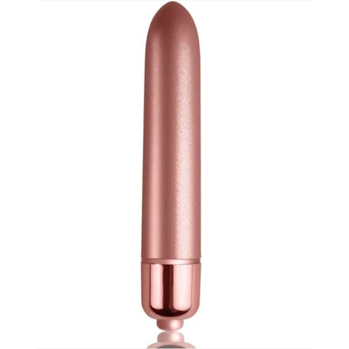 Rose gold bullet-shaped object on a white background