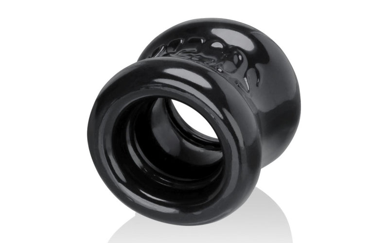 OxBalls SQUEEZE Night Edition black hourglass ball stretcher in silky Flex-TPR.