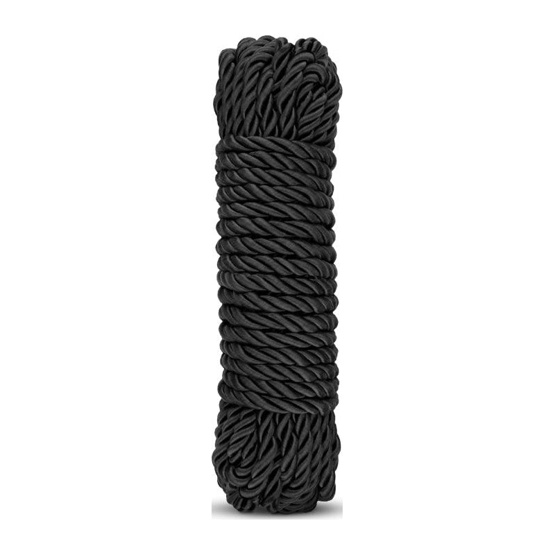 A coil of black cotton bondage rope, approximately 5 meters in length.