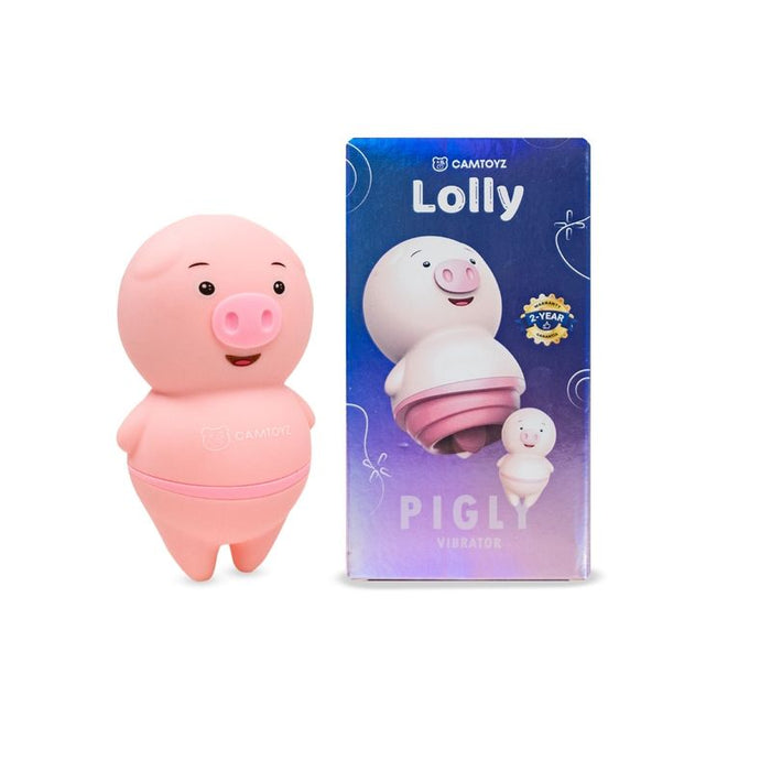 The image shows the Pigly Clitoral Stimulator, which is designed to resemble a pink tongue. It is packaged in a box that features a cartoon-style pig.