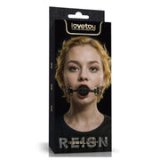 Product packaging with a woman's face and 'lovetoy' branding on a white background
