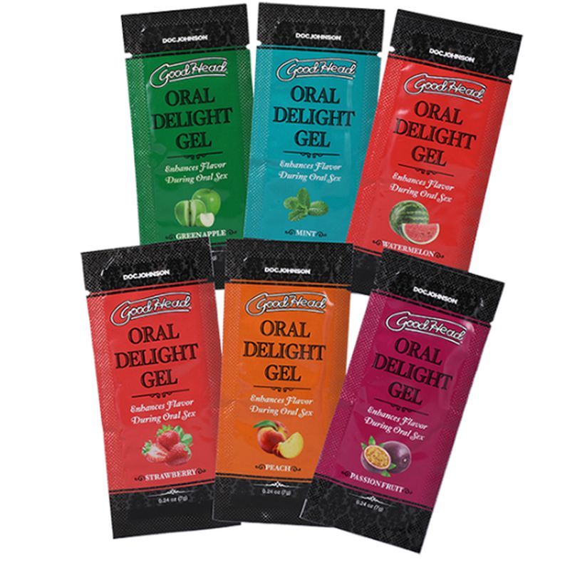 Assorted packages of GoodHead Oral Delight Gel in different flavors on a white background