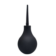 Black bulb syringe on a white background