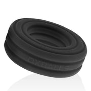 Black Roto Grooved Gripper showing its flat profile and ribbed surface