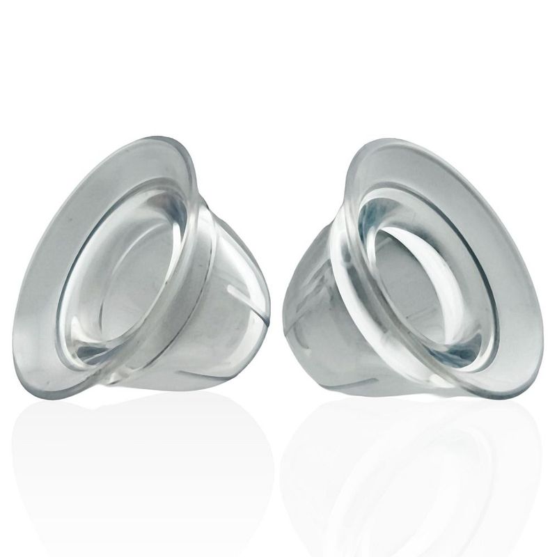Pair of clear Nano Nips nipple suckers showing their openings and transparent construction