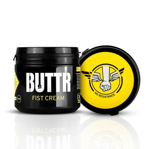 Black container of BUTTR Fist Cream with yellow lid on a white background