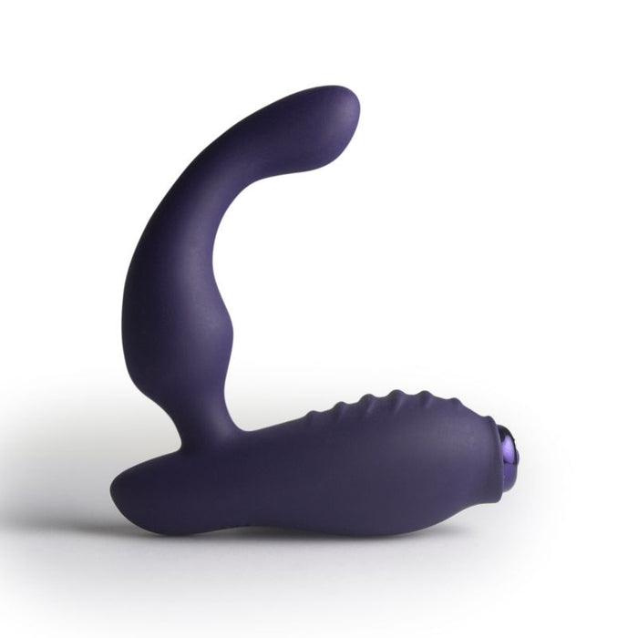 Purple silicone butt plug on a white background