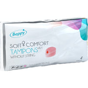 Packaging of Beppy Soft+Comfort Sponge Tampons, pink color, with a quantity of 4. The packaging is marked with the product name and the phrase ' Without String'.