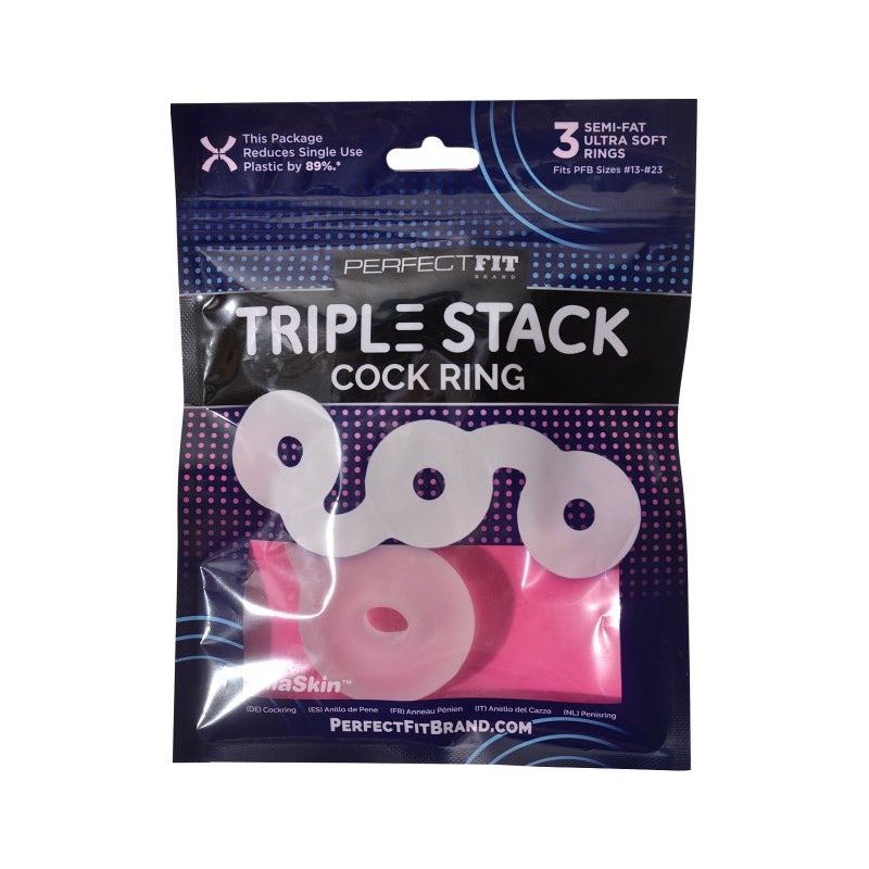 The image shows a packaged Perfect Fit Triple Stack Donut Cock Ring in clear color. The packaging highlights features including velvety soft material, adaptable fit, and versatility in use.